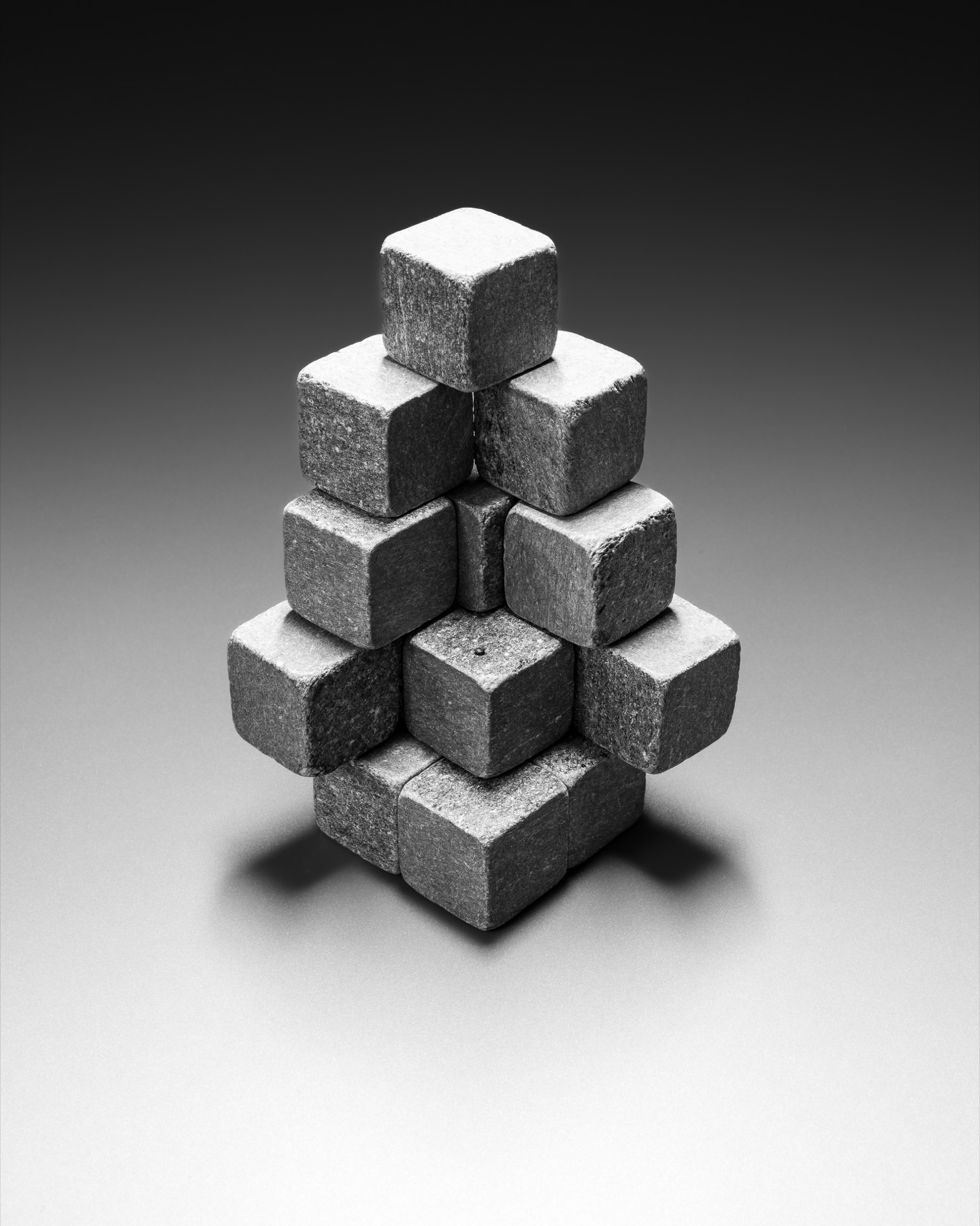 Monochrome stone blocks arranged into a precise structural system